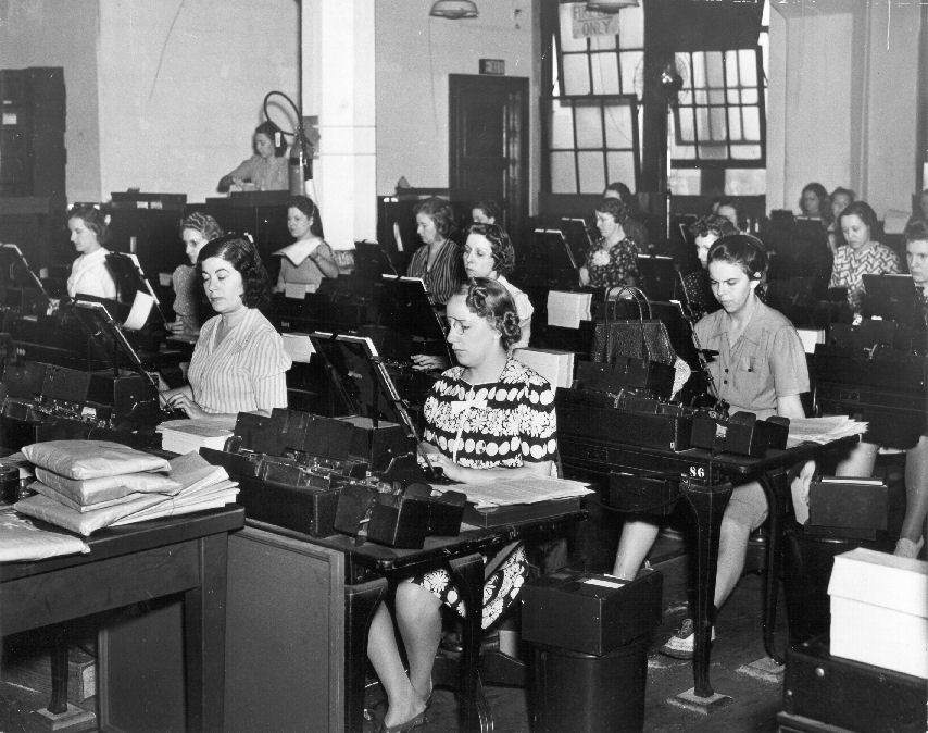 women operating keypunch machines